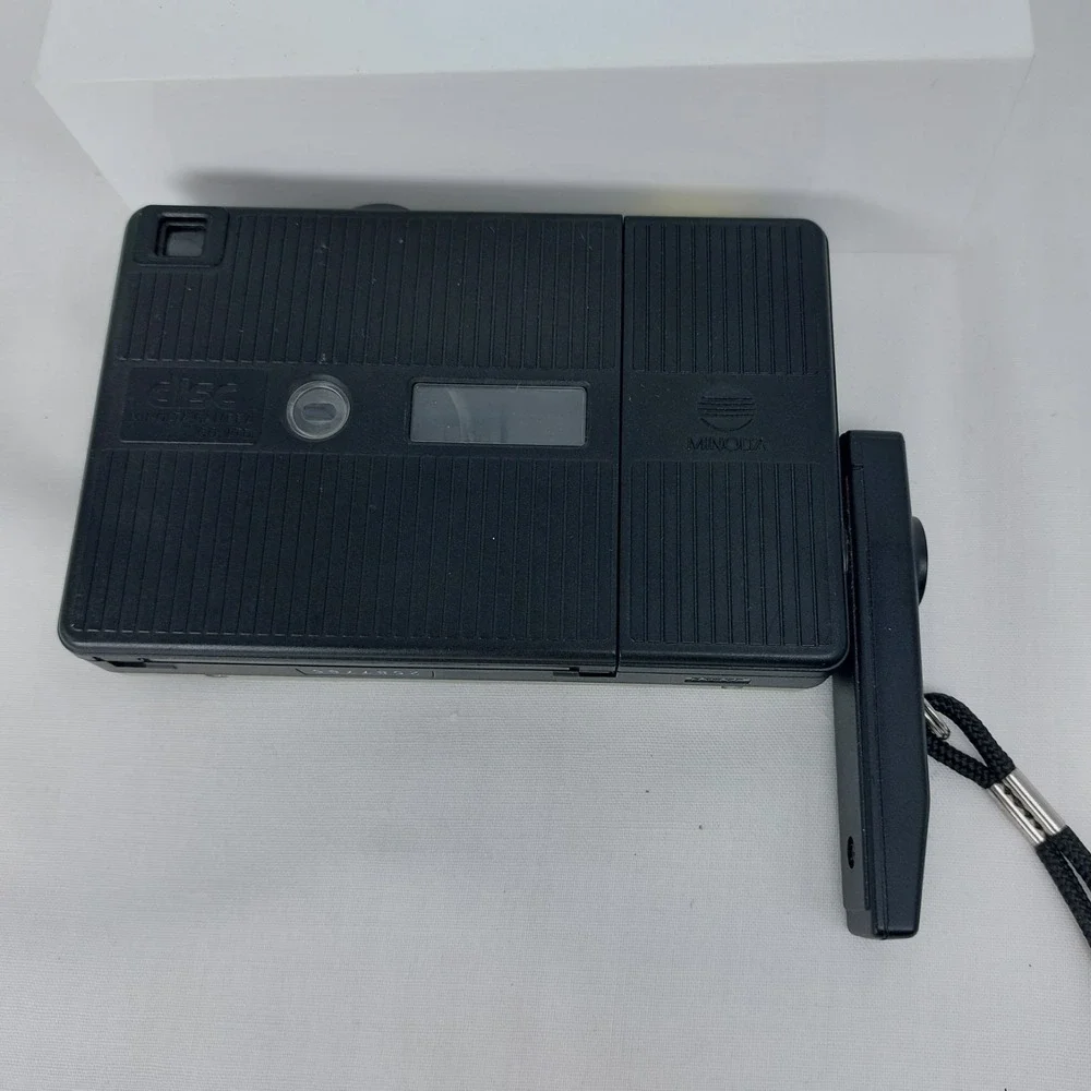 Minolta Disc-K 2509879 Camera With‎ Flash Rope Lanyard